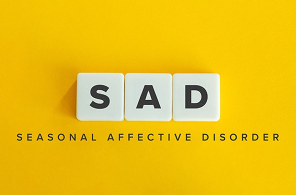 Letter tiles, each with "S," "A," and "D", with "Seasonal Affective Disorder" written below.