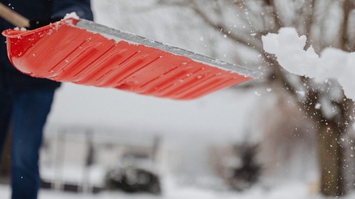 Image of person shoveling snow. Photo credit: Pexels, Karolina Grabowska